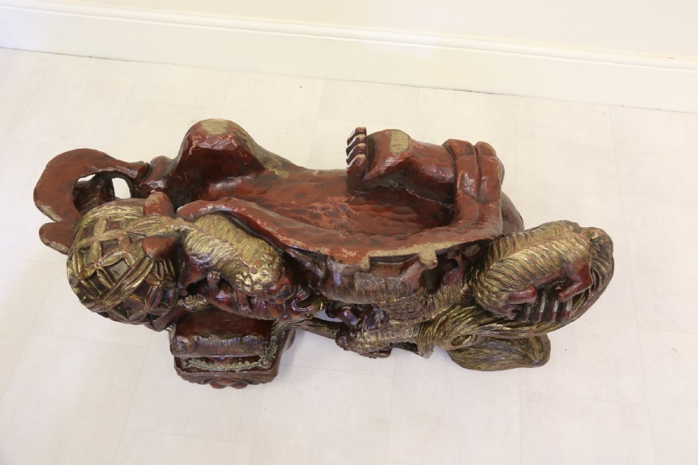 A rare pair of Chinese Mythical Beasts/Dogs of Foo on Stands View XV