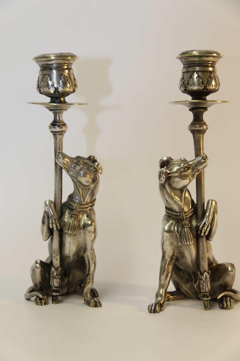 A pair of English Novelty Grey Hound Candlesticks, Silvered Bronze View III