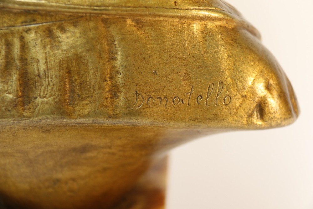 A gilt bronze bust of a boy after Donatello View VI