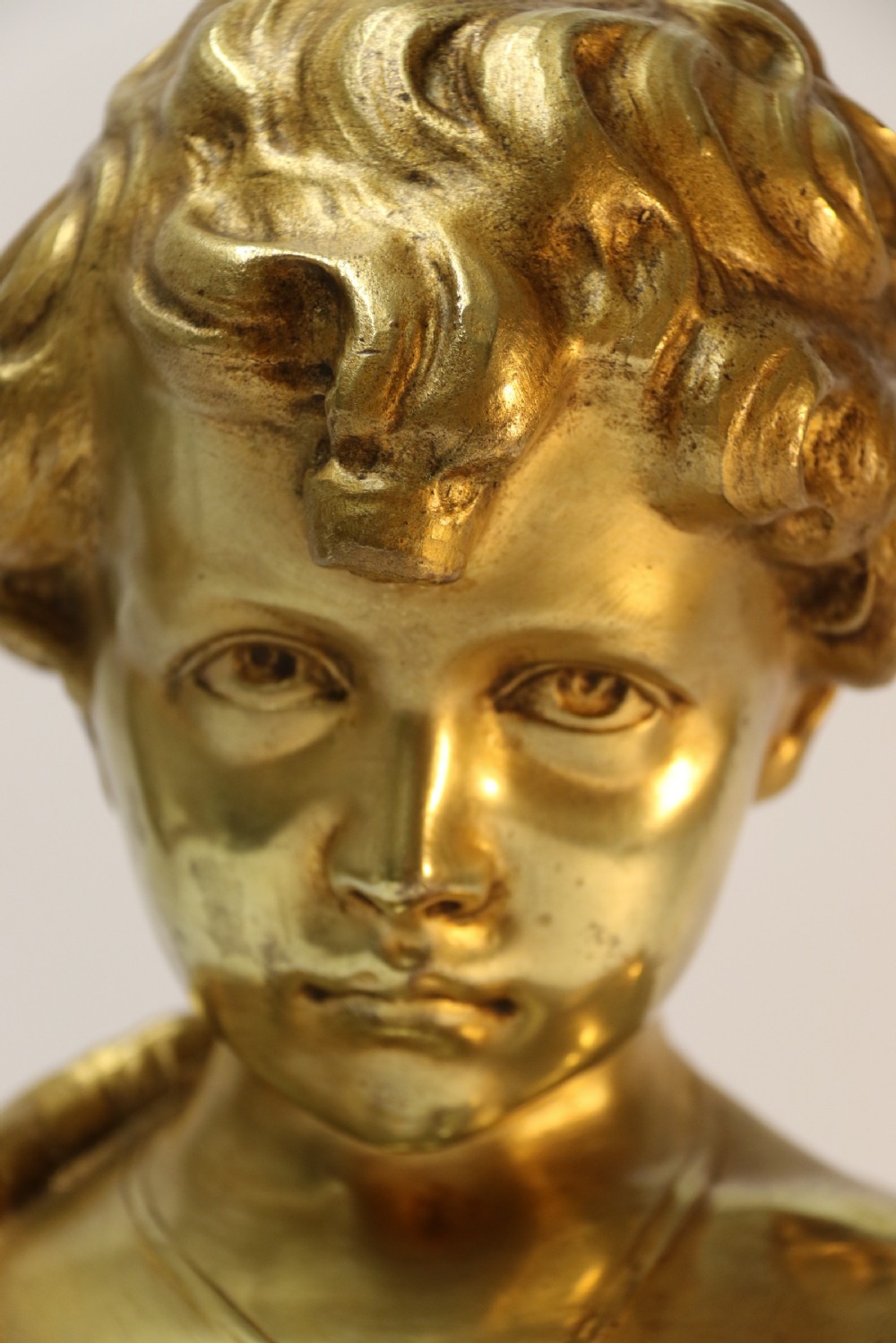A gilt bronze bust of a boy after Donatello View VIII
