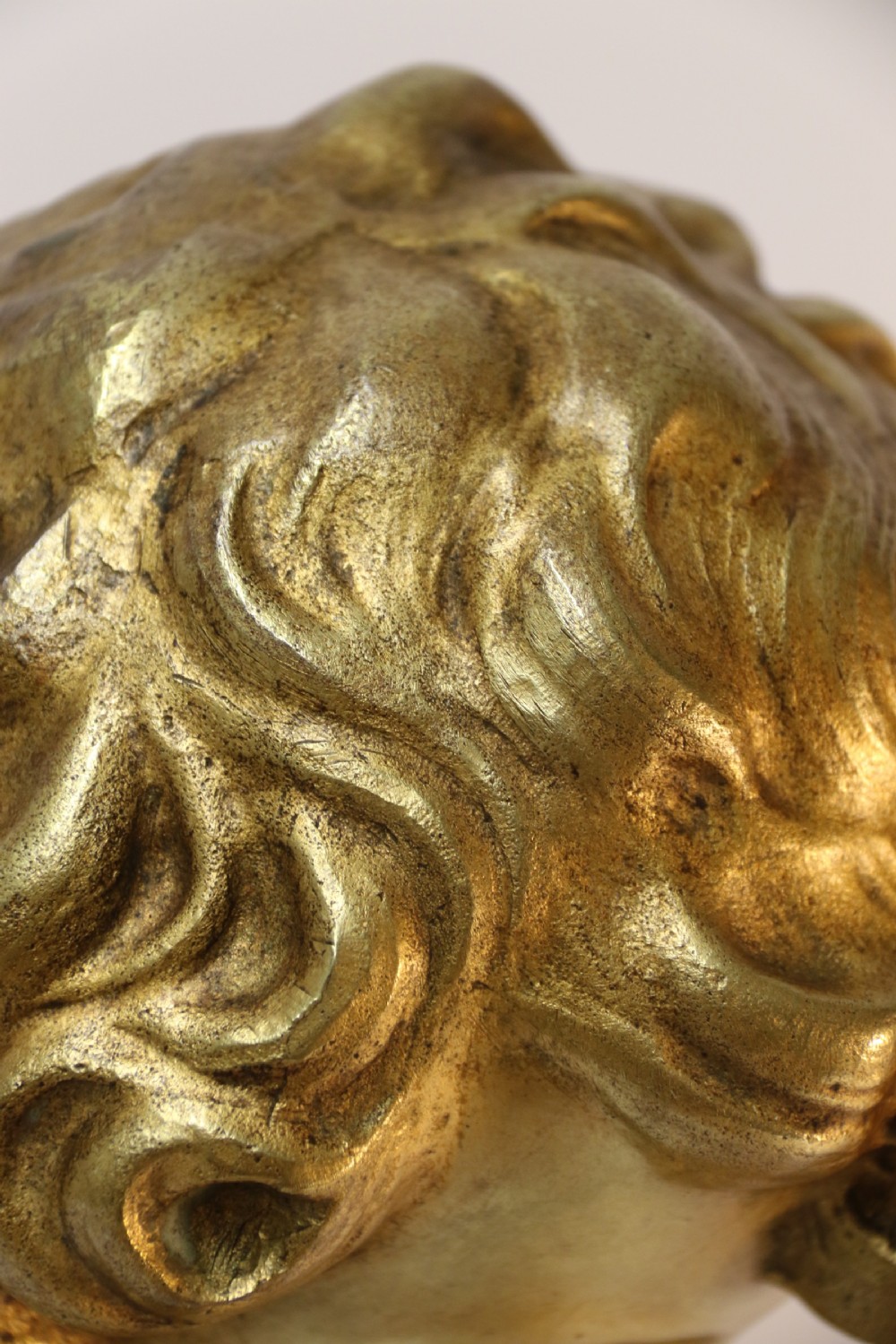 A gilt bronze bust of a boy after Donatello View XIII