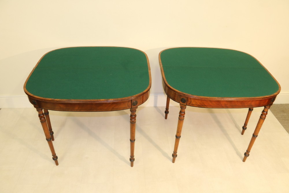 A rare pair of Regency Mahogany Card Tables View X