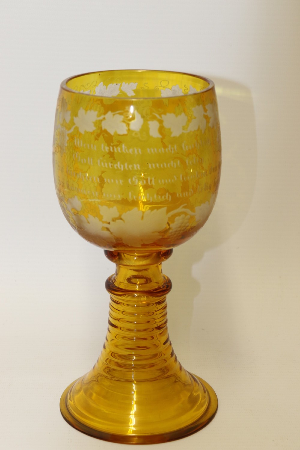 A German Amber Glass engraved Goblet View VI