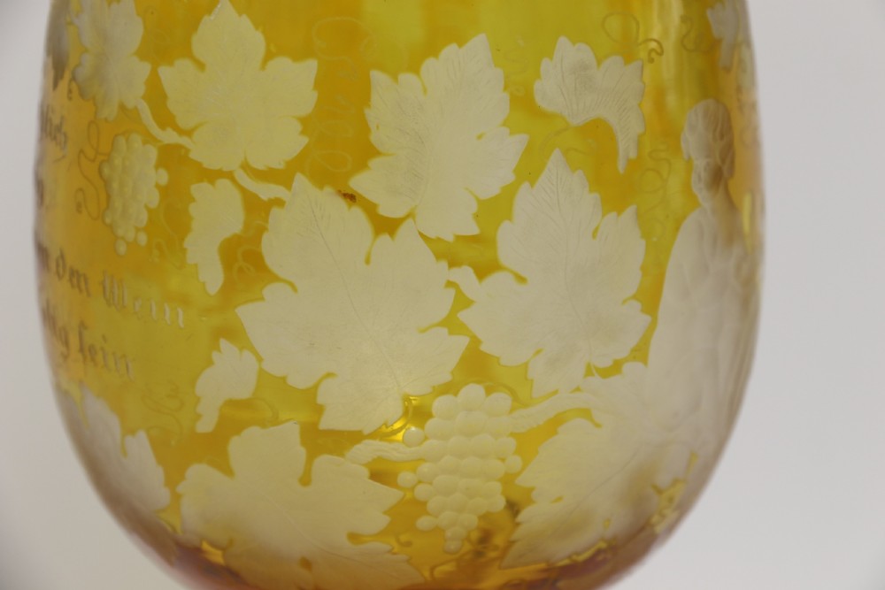 A German Amber Glass engraved Goblet View IX