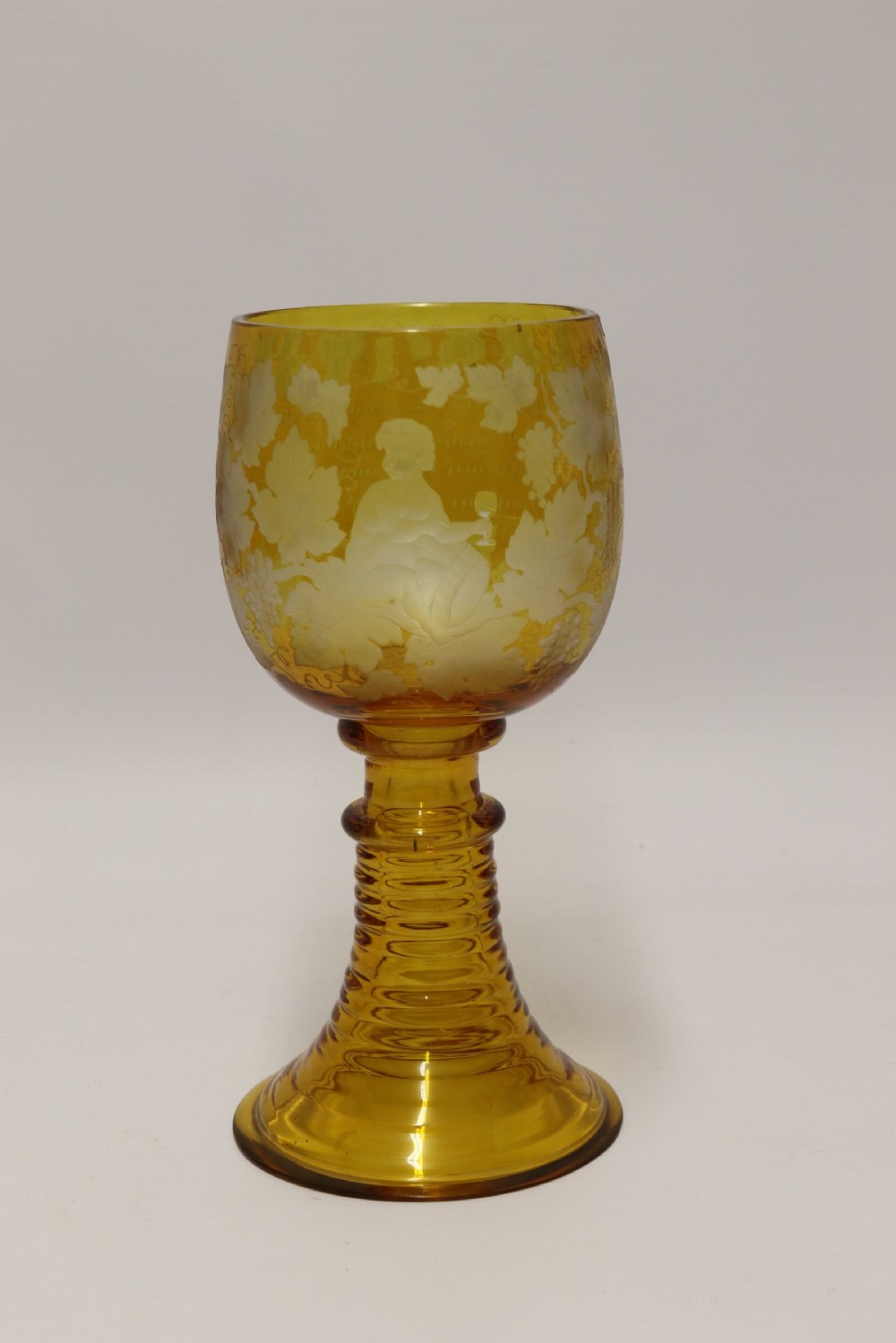 A German Amber Glass engraved Goblet View XIII