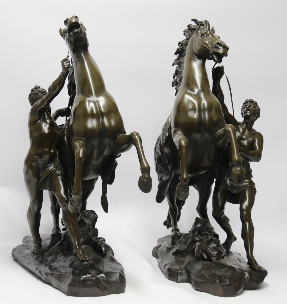 A large pair of bronze Marly Horses after Costou.
