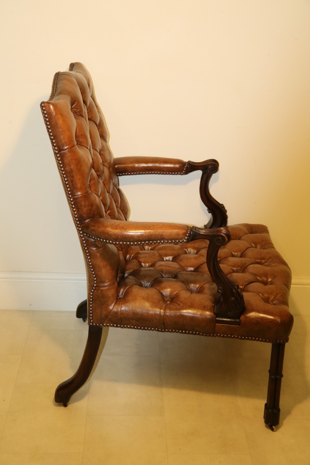 A superb 19th c Chippendale style Gainsborough Arm Chair.   View XV