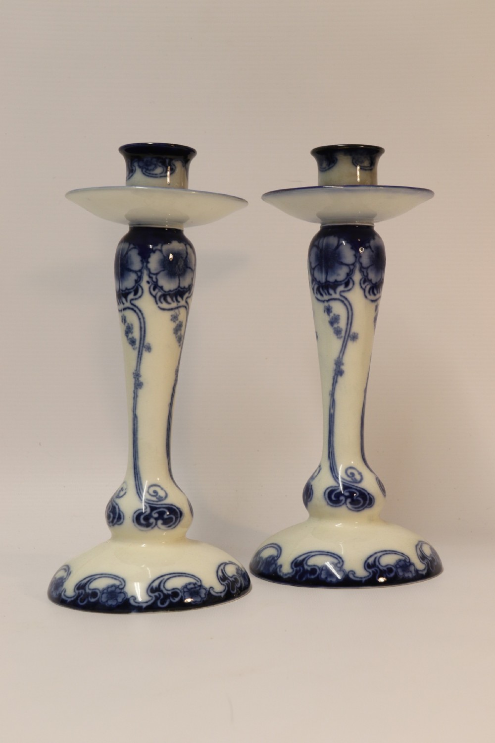 A pair of Art Nouveau Pottery Candle sticks View II