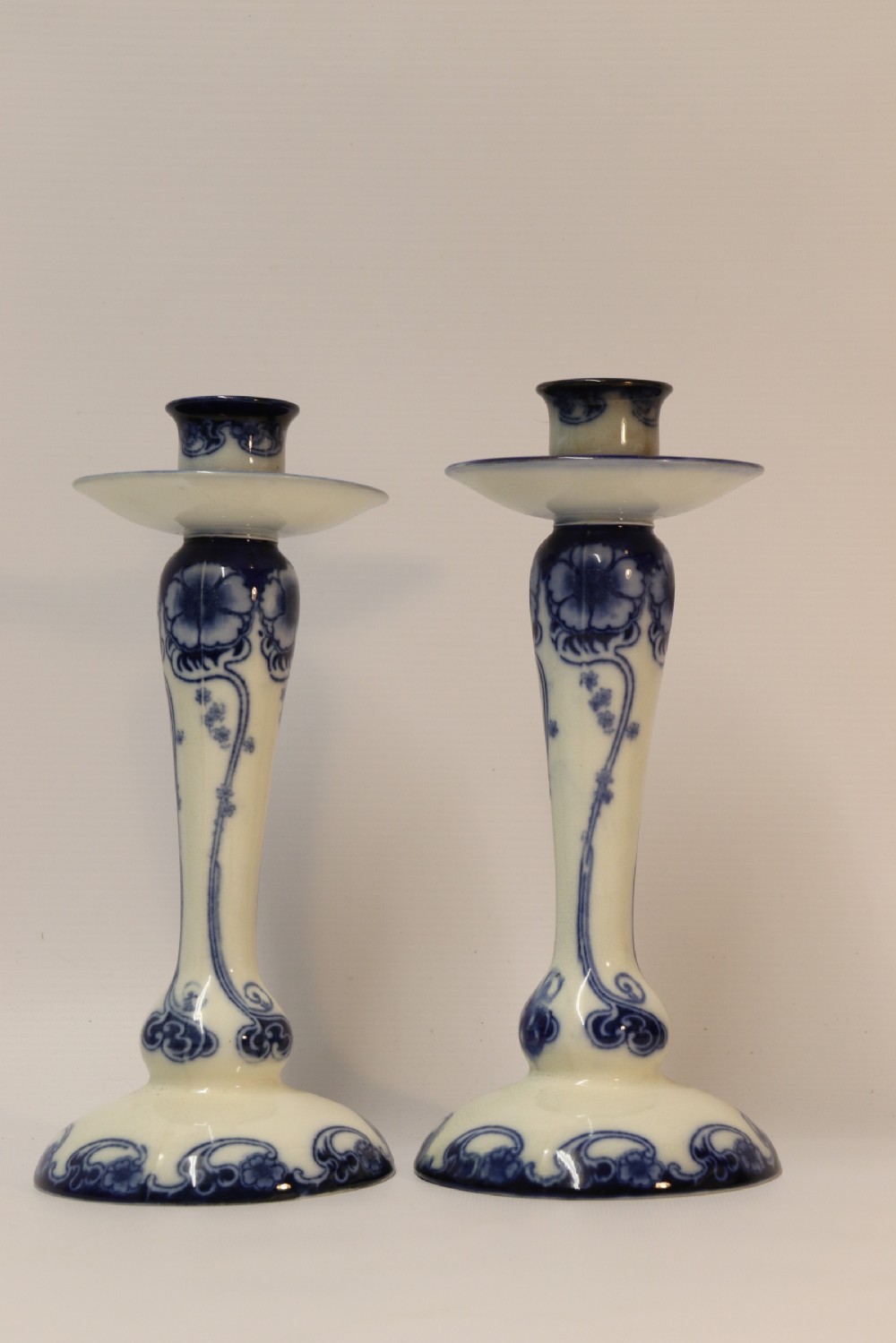 A pair of Art Nouveau Pottery Candle sticks View III