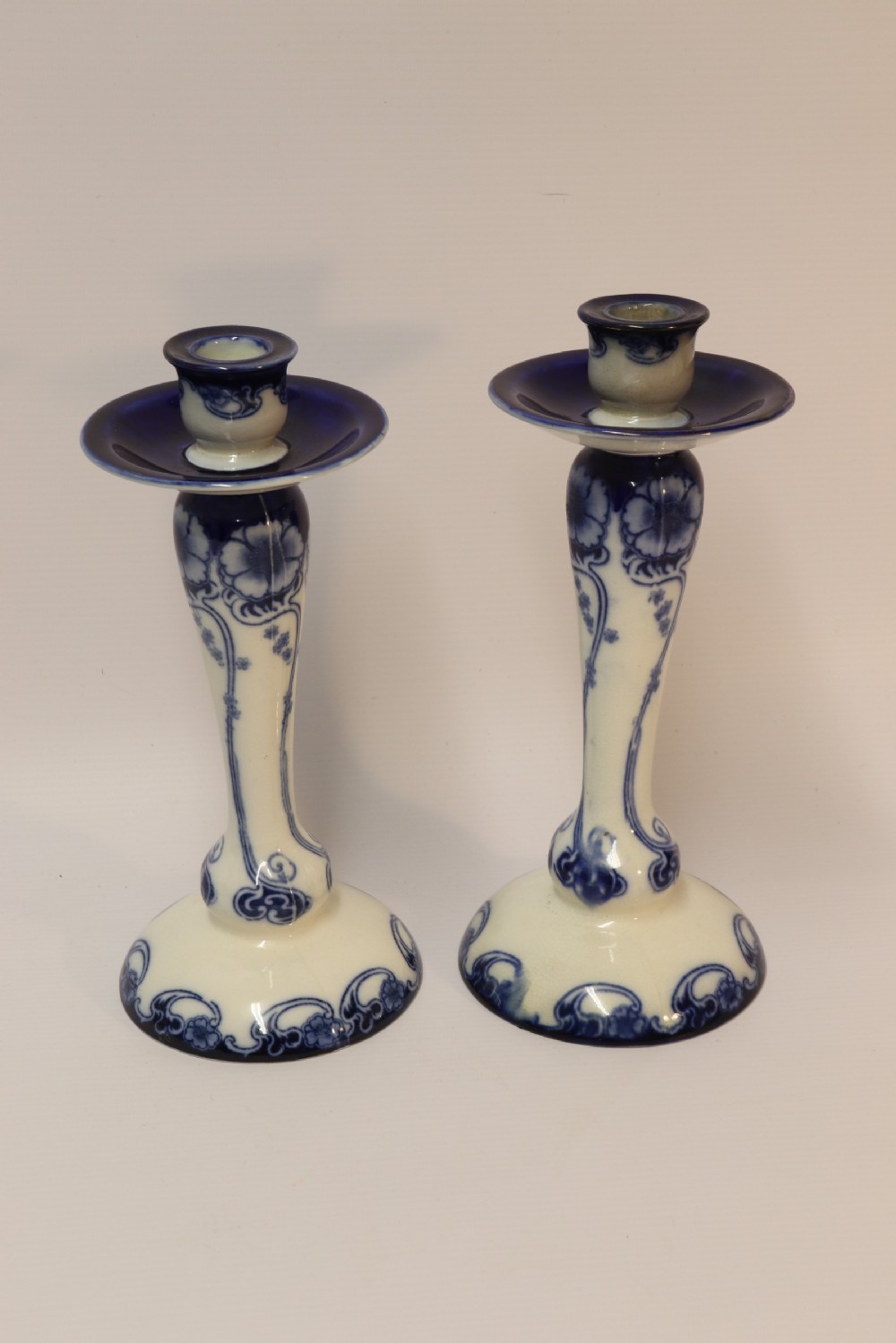 A pair of Art Nouveau Pottery Candle sticks View V