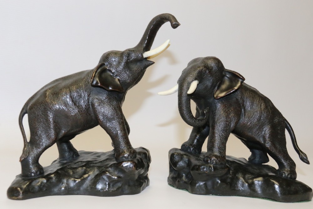 A pair of Japanese bronze elephant bookends Meiji Period, signed. View II