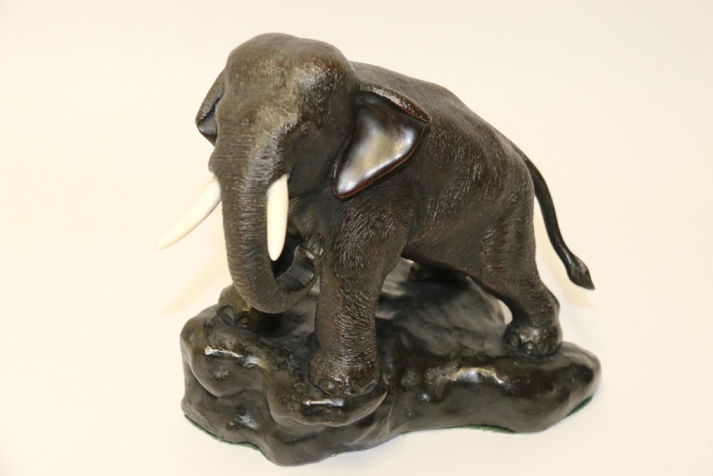 A pair of Japanese bronze elephant bookends Meiji Period, signed. View IV