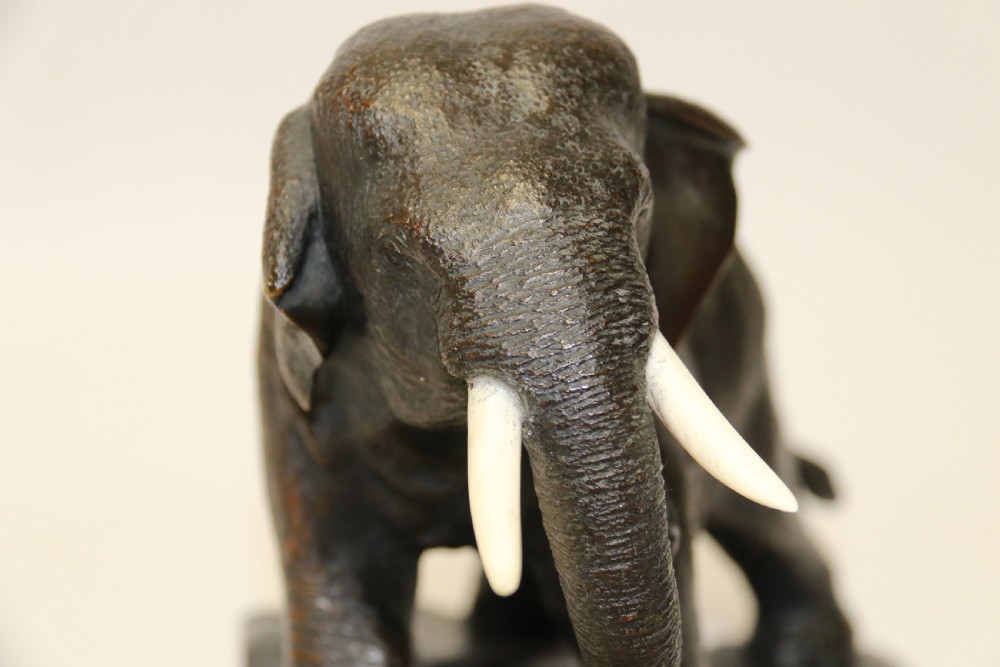A pair of Japanese bronze elephant bookends Meiji Period, signed. View VI