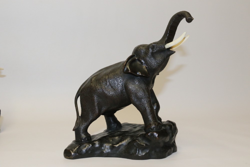 A pair of Japanese bronze elephant bookends Meiji Period, signed. View XVI