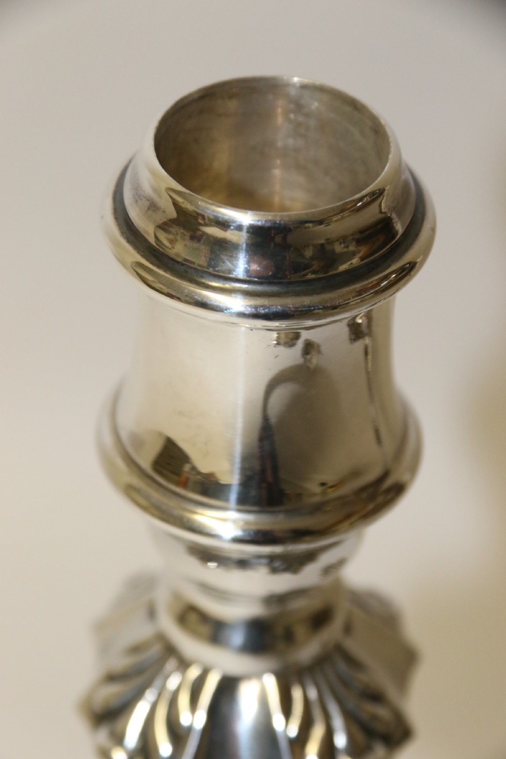 A fine pair of heavy gauge silver candle sticks View XI