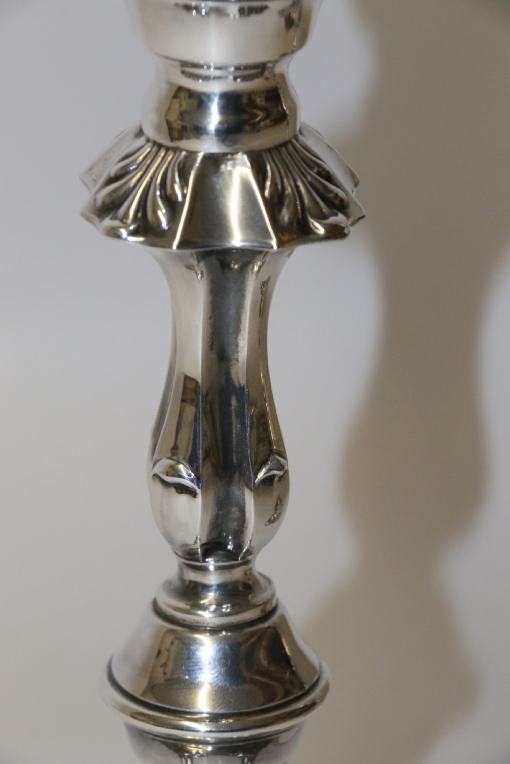 A fine pair of heavy gauge silver candle sticks View XII