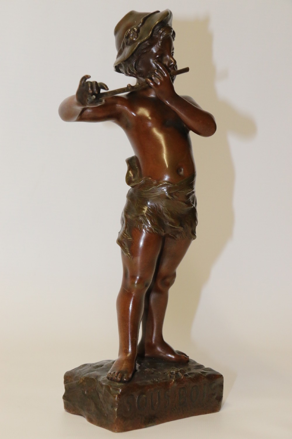 A 19th C Bronze figure of a Boy Playing a Flute, by Marcel Debut View II
