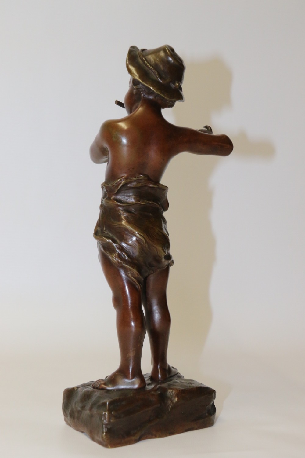 A 19th C Bronze figure of a Boy Playing a Flute, by Marcel Debut View VII