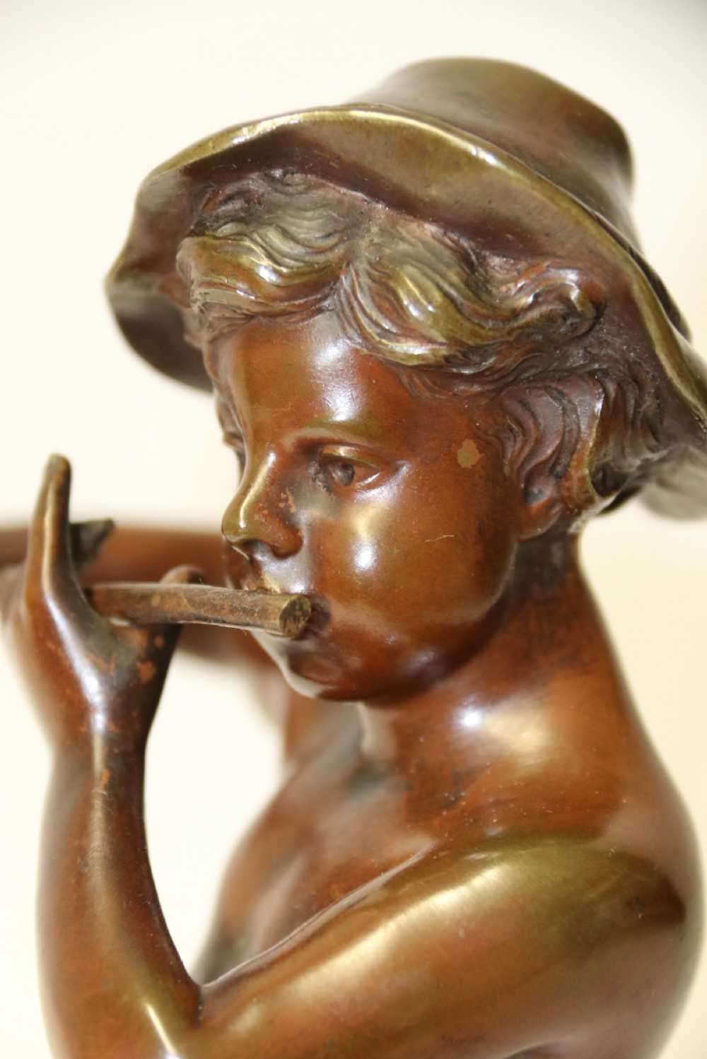 A 19th C Bronze figure of a Boy Playing a Flute, by Marcel Debut View X