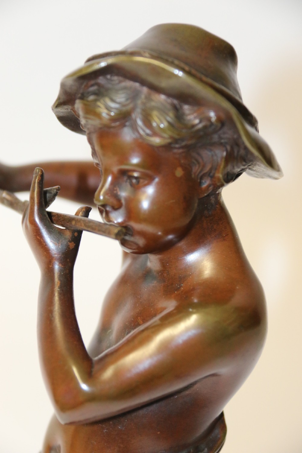 A 19th C Bronze figure of a Boy Playing a Flute, by Marcel Debut View XI