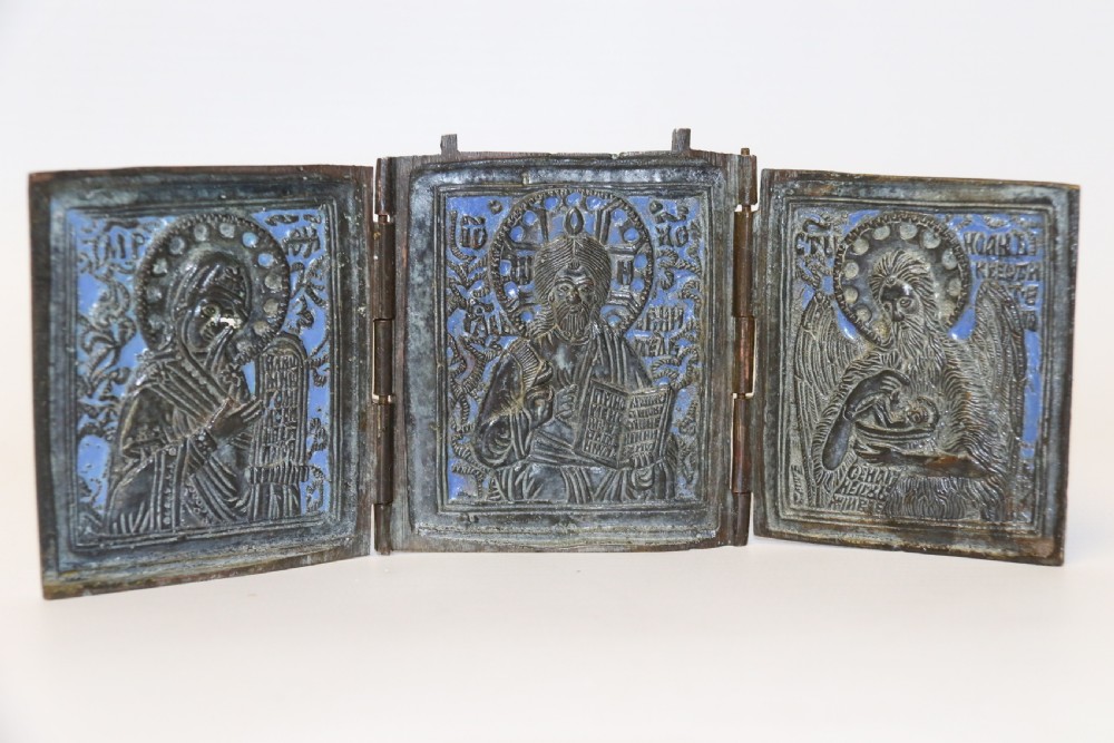 A 19th century Russian folding bronze and enamel icon