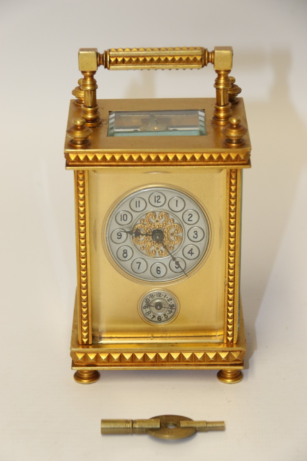 A superb late 19th C Gilt Brass Carriage clock with an Alarm View V