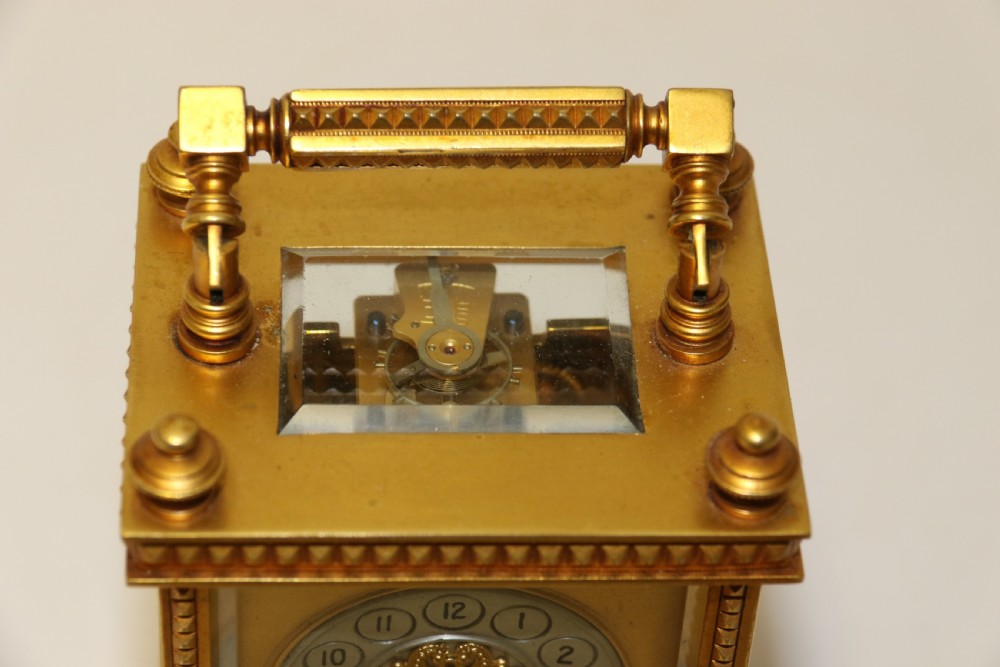 A superb late 19th C Gilt Brass Carriage clock with an Alarm View VI