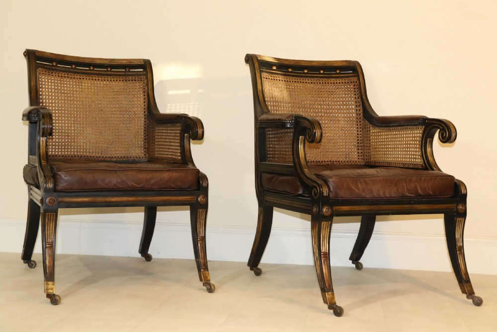 A superb pair of Bergère Library Chairs.