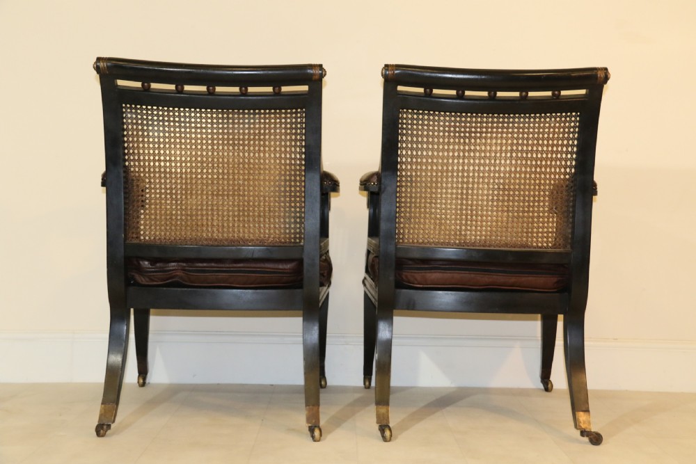 A superb pair of Bergère Library Chairs. View V