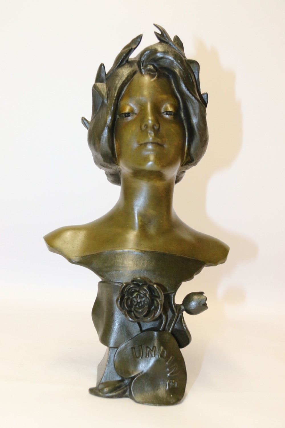 An Art Nouveau Spelter bust of a beautiful young woman entitled Undine View II