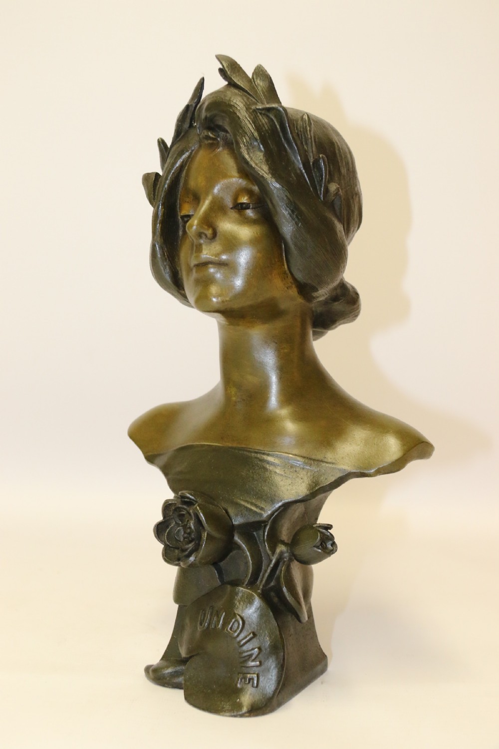 An Art Nouveau Spelter bust of a beautiful young woman entitled Undine View III