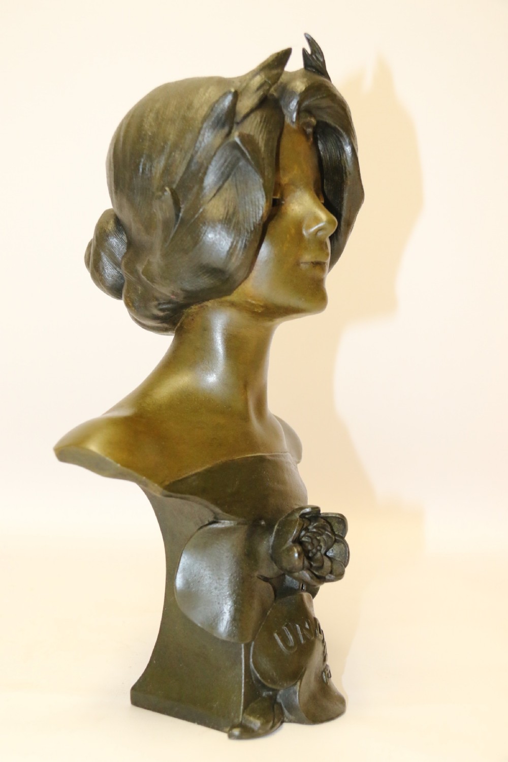 An Art Nouveau Spelter bust of a beautiful young woman entitled Undine View IV