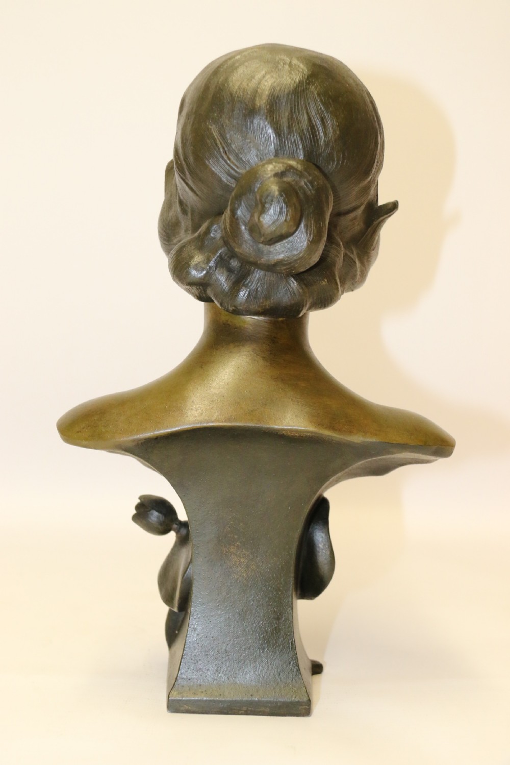 An Art Nouveau Spelter bust of a beautiful young woman entitled Undine View V