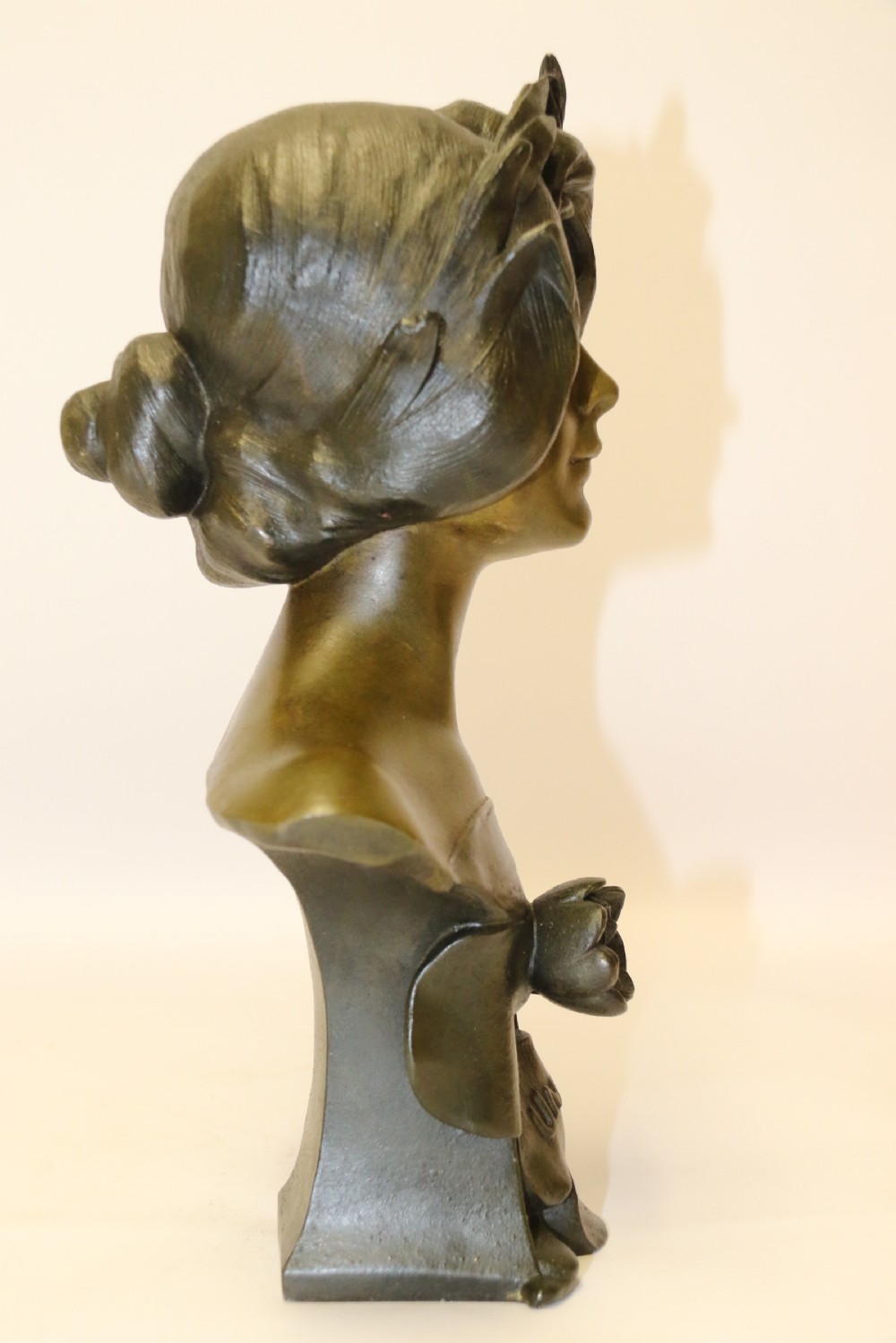 An Art Nouveau Spelter bust of a beautiful young woman entitled Undine View VI
