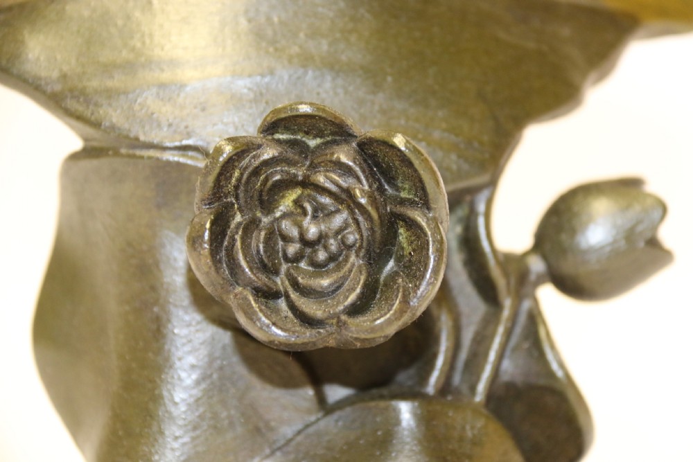 An Art Nouveau Spelter bust of a beautiful young woman entitled Undine View IX
