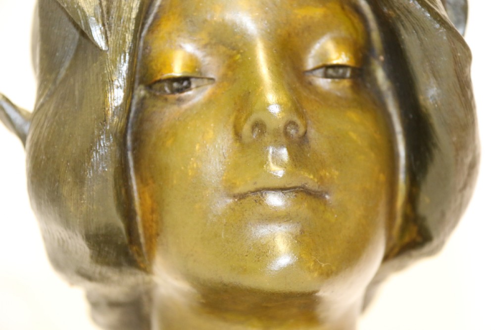 An Art Nouveau Spelter bust of a beautiful young woman entitled Undine View X