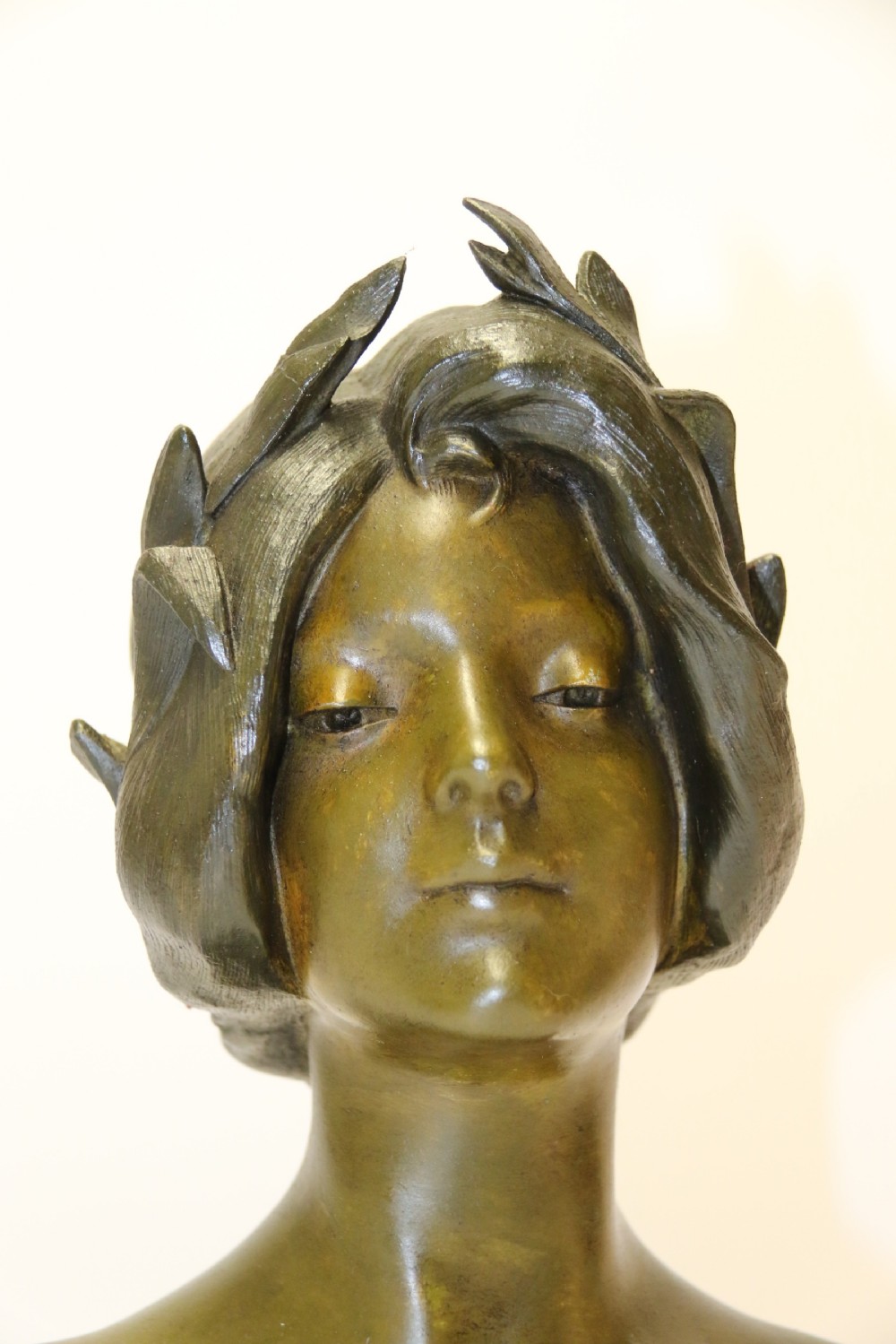 An Art Nouveau Spelter bust of a beautiful young woman entitled Undine View XI