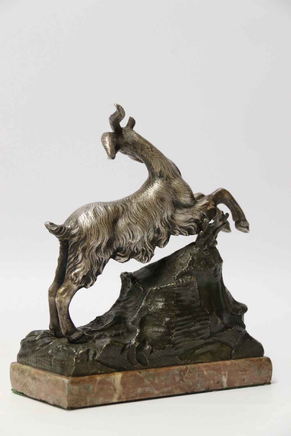 A mid 19th Century Silvered Bronze Study of  a Goat.  View VI