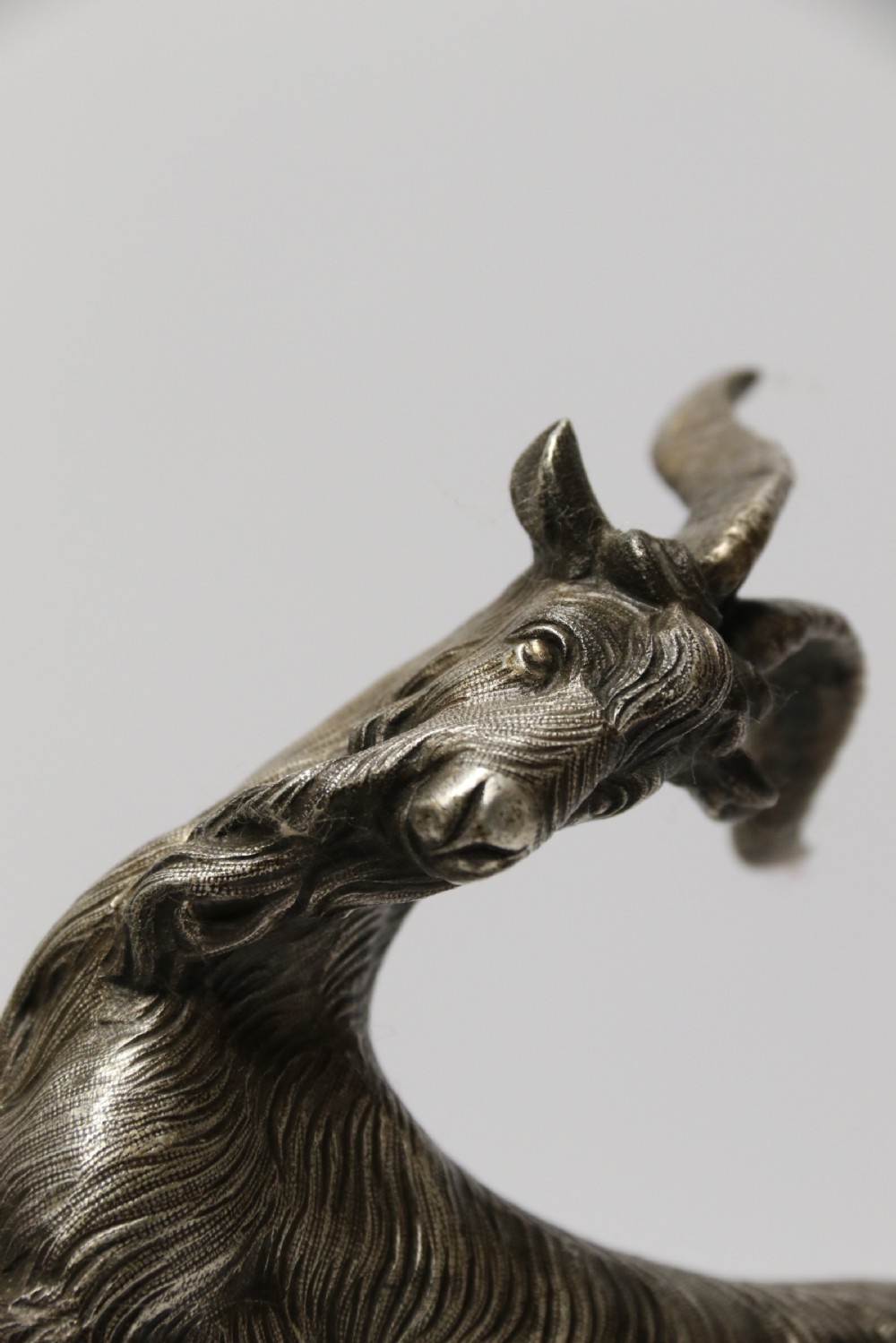 A mid 19th Century Silvered Bronze Study of  a Goat.  View IX