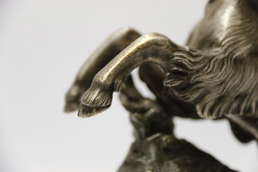 A mid 19th Century Silvered Bronze Study of  a Goat.  View X