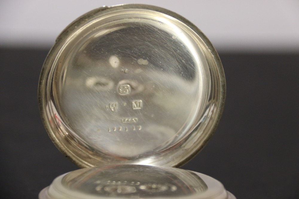 An Over sized Silver Chronograph Pocket Watch and Chain with Mining Tug of War Fob. View IX