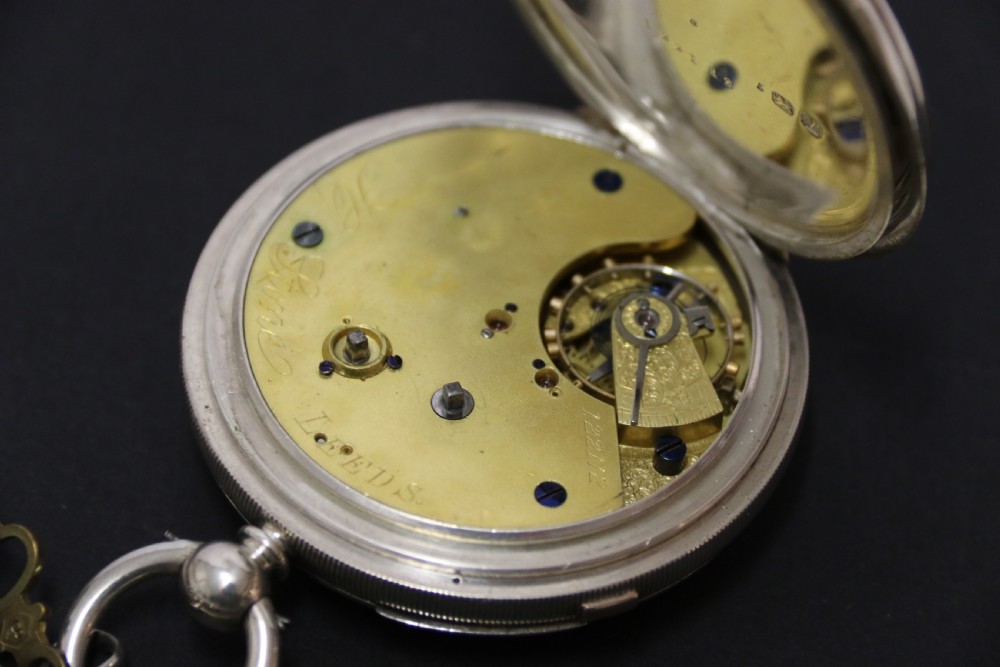 An Over sized Silver Chronograph Pocket Watch and Chain with Mining Tug of War Fob. View XI