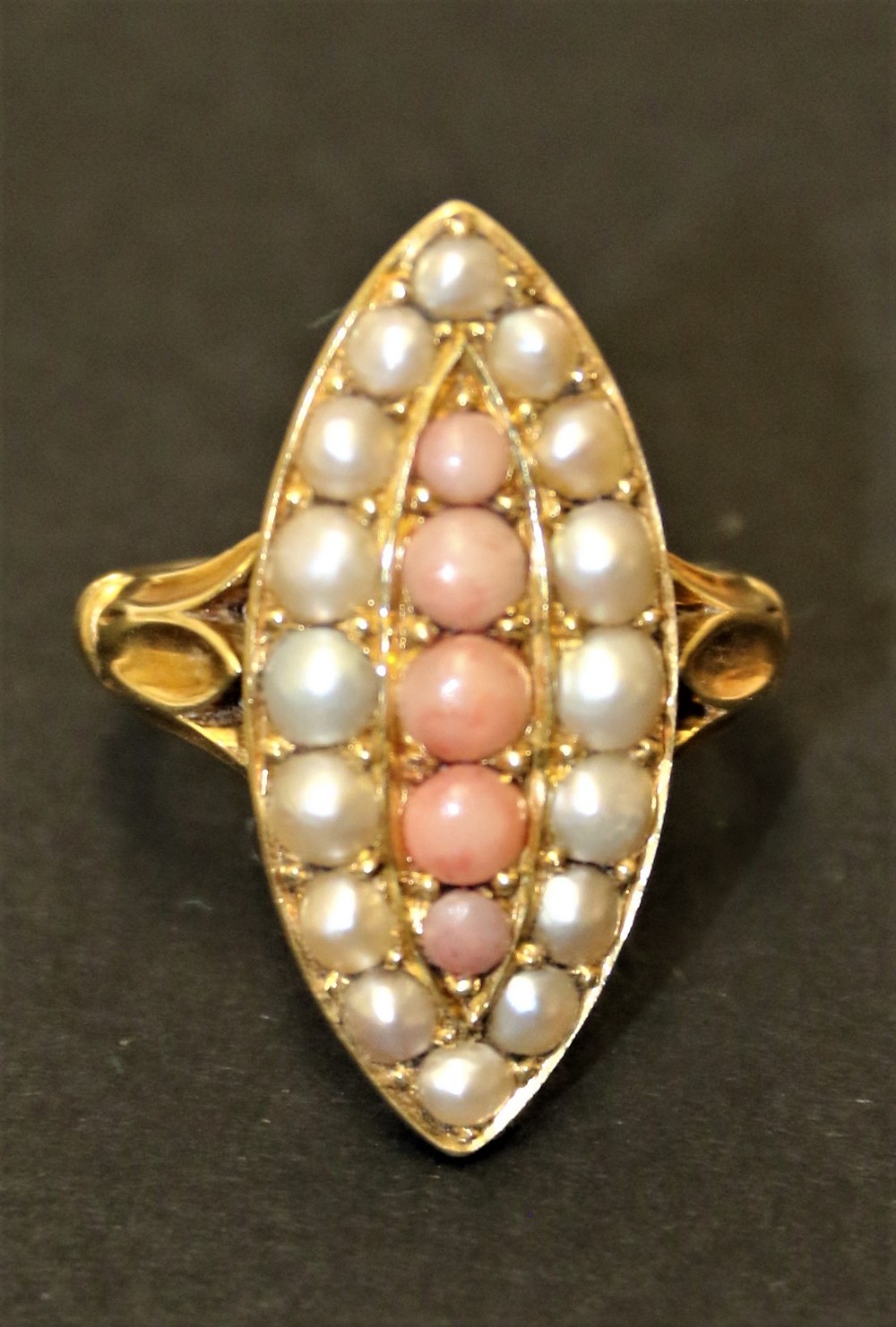 An early Victorian 18 ct. coral and pearl cluster ring.