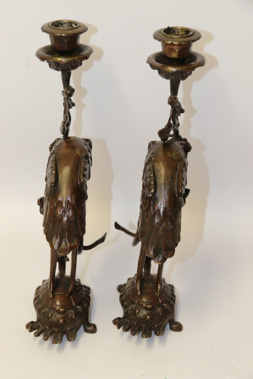 A pair of French bronze Candlesticks in the form of Storks View IX