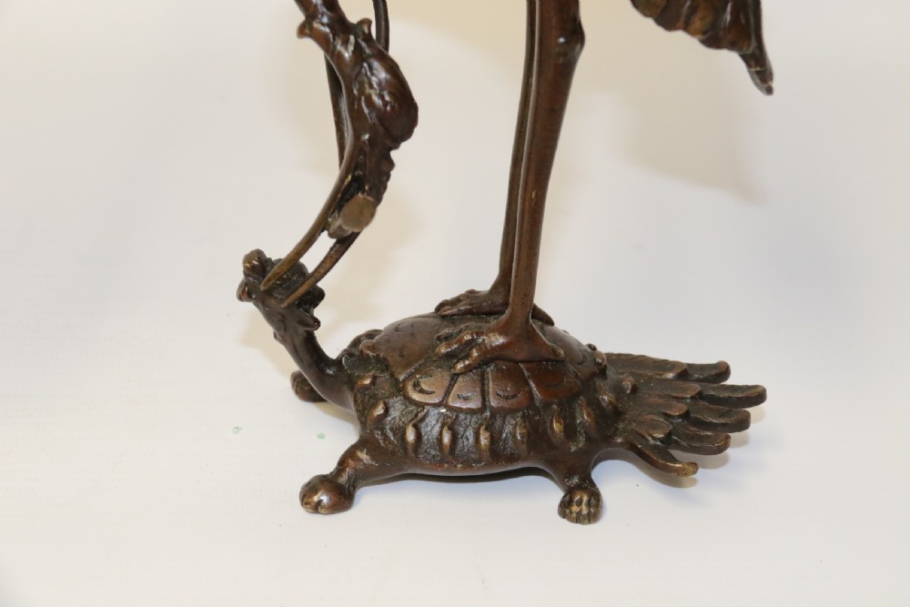 A pair of French bronze Candlesticks in the form of Storks View XII