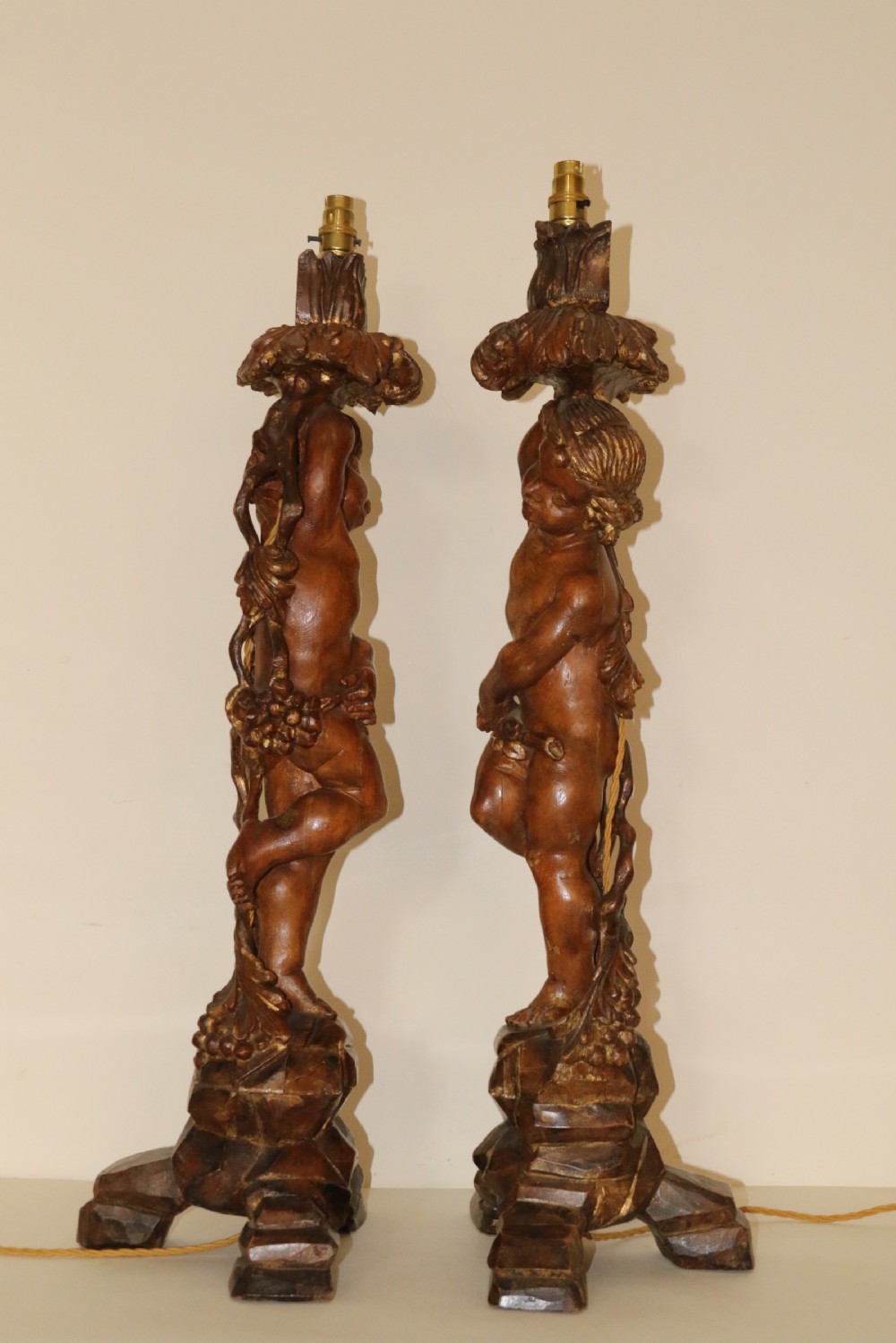 A large pair of carved wooden cherub lamps   View VIII