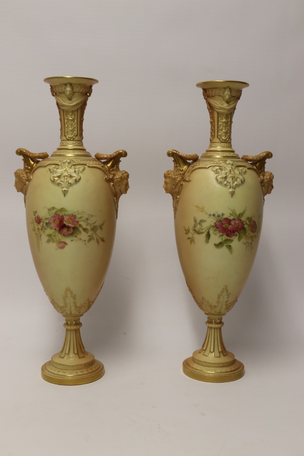A Large pair of Antique Royal Worcester Hand Painted Blush Ivory Pedestal Vases. View III