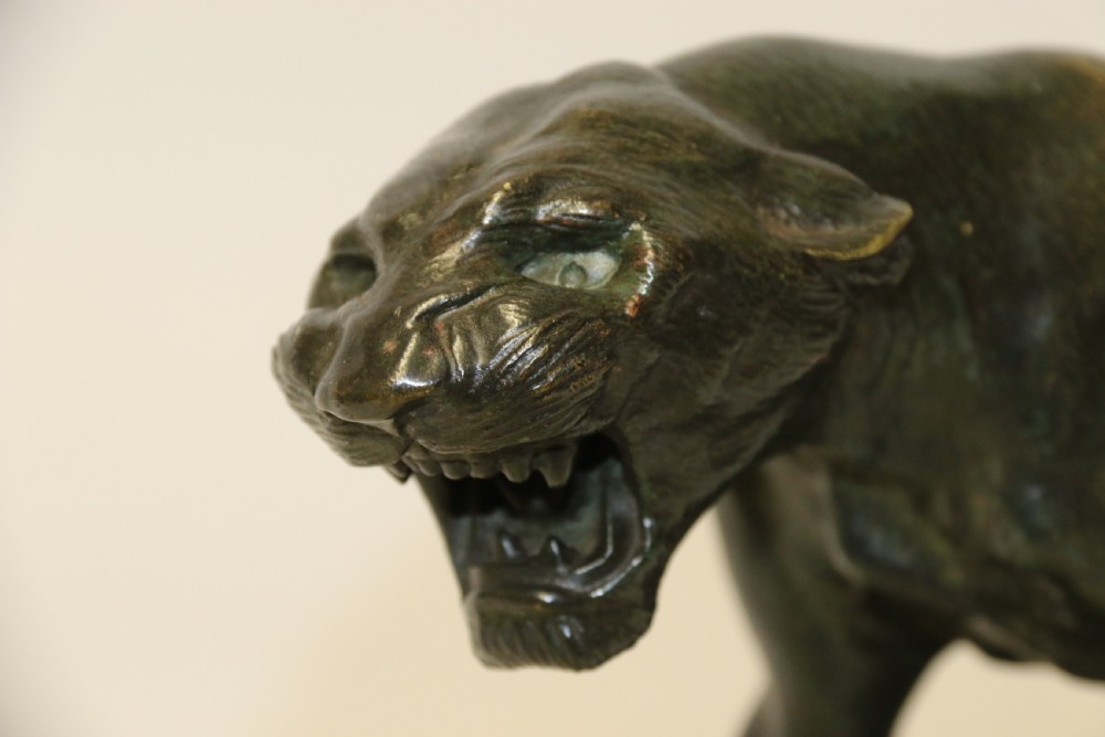 An early 20th Century Bronze Study of a Panther by Thomas Cartier View IV