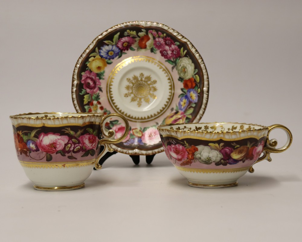 A fine Antique English hand painted Coalport porcelain Cabinet Trio.