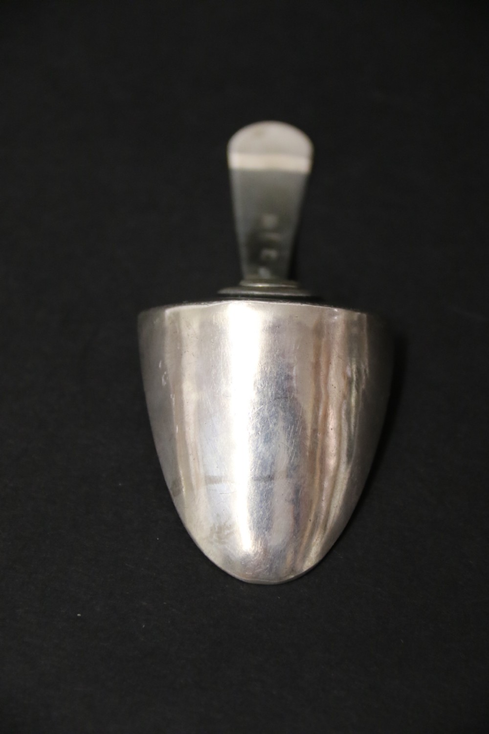 An antique silver George III Tea Caddy Spoon View VI